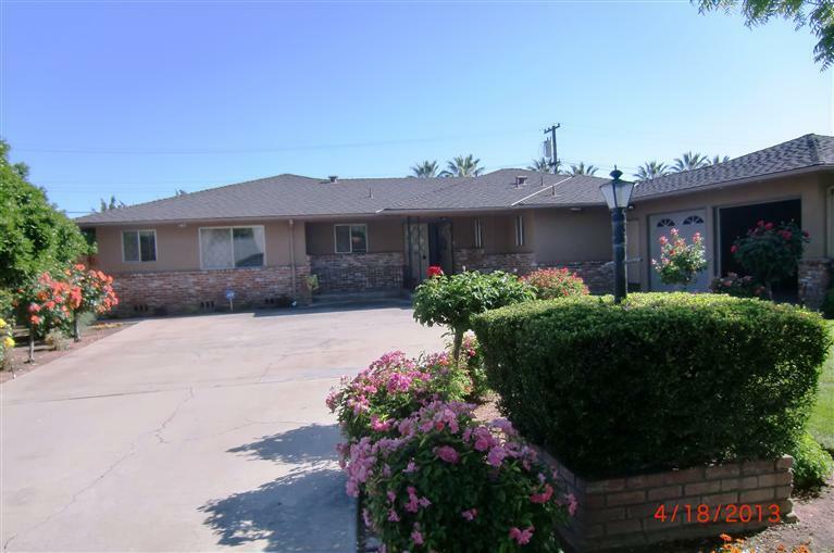 Property Photo:  5076 East White Ave  CA 93727 