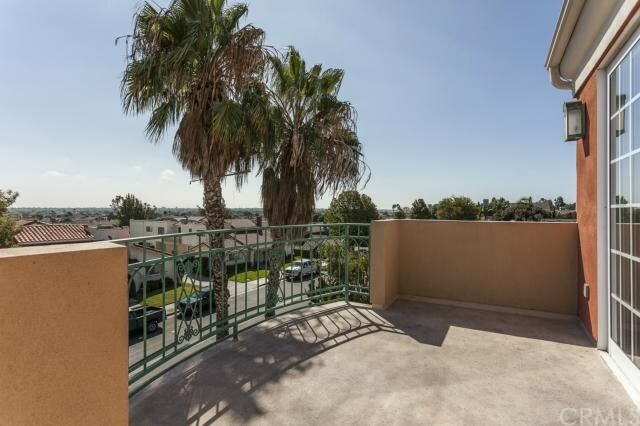 Property Photo:  5142 Warner Avenue 305  CA 92649 