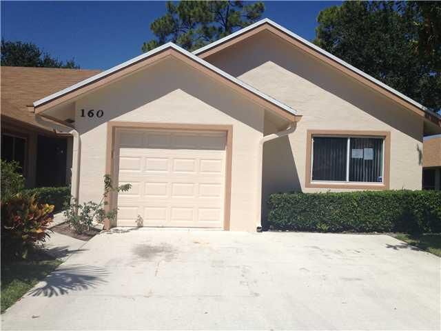 Property Photo:  160 Par Drive  FL 33411 