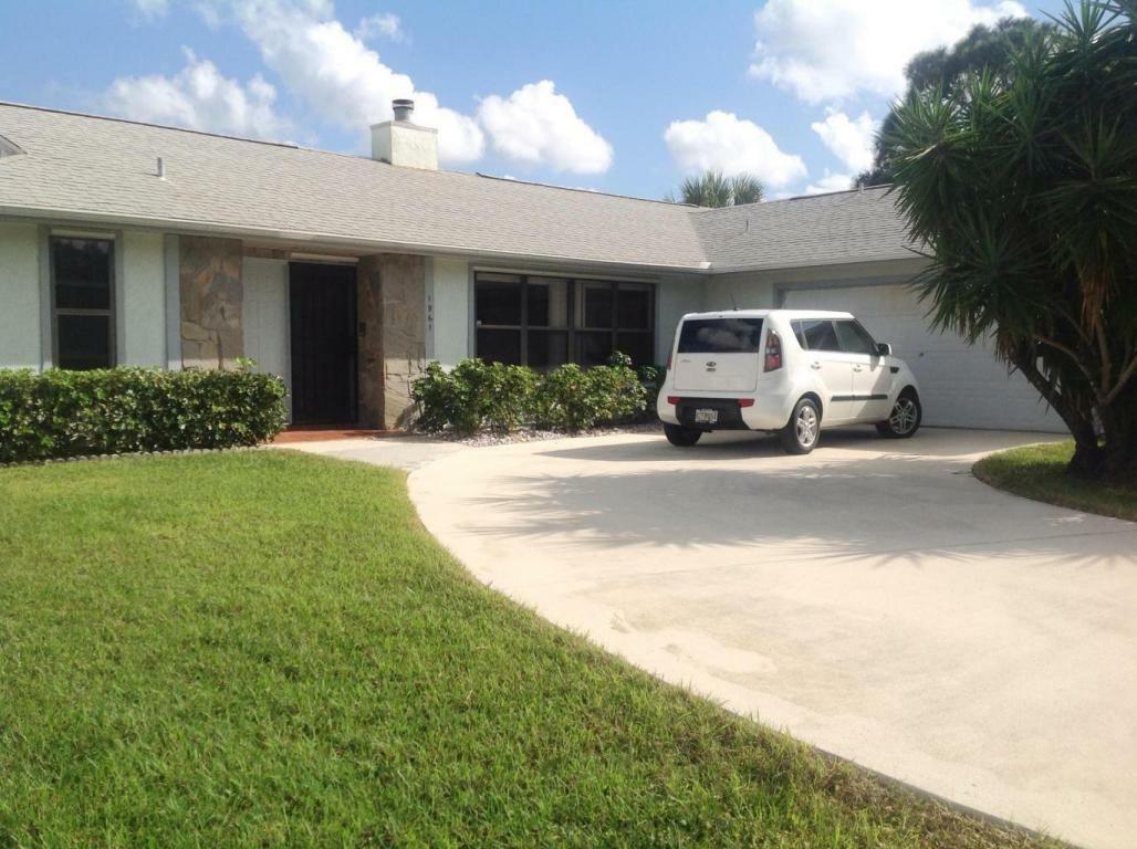 Property Photo:  1961 SE S Buttonwood Drive  FL 34953 