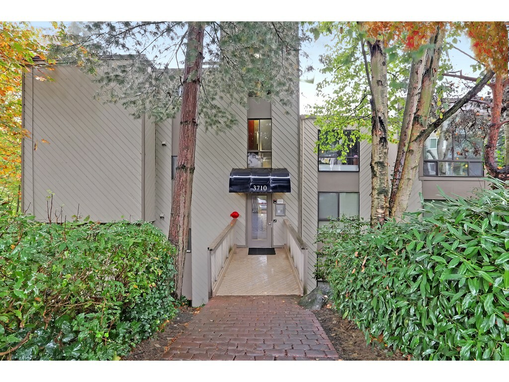 Property Photo:  3710 26th Place W 409  WA 98199 