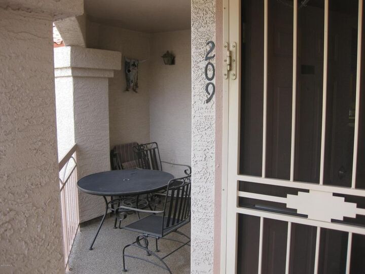 Property Photo: 9151 W Greenway Road 209 AZ 85381