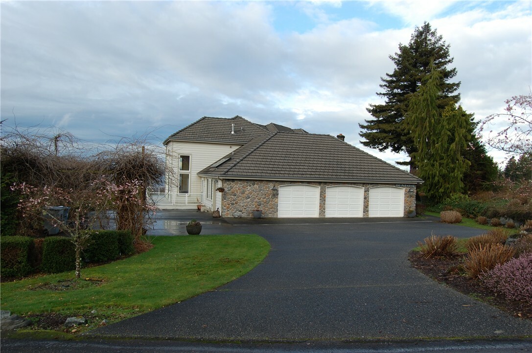 Property Photo:  4441 Paradise Ave W  WA 98466 