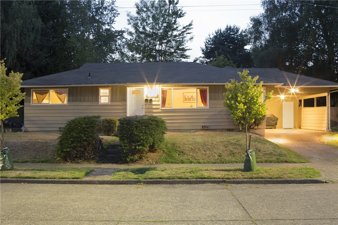 Property Photo:  10687 62nd Ave S  WA 98178 