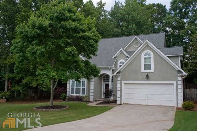 Property Photo: 1065 Grand Oaks Glen 02/66 GA 30064
