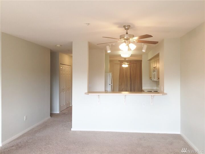 Property Photo:  15340 Macadam Road S B205  WA 98188 