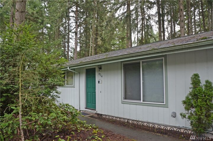 Property Photo: 4712 Reid Dr NW 1-2 WA 98335