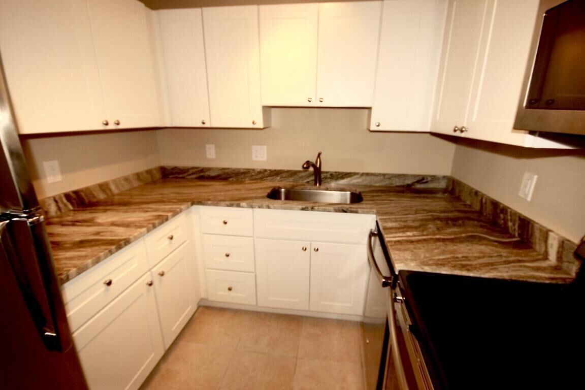 Property Photo:  1741 3rd Avenue N Apt. #3  FL 33460 