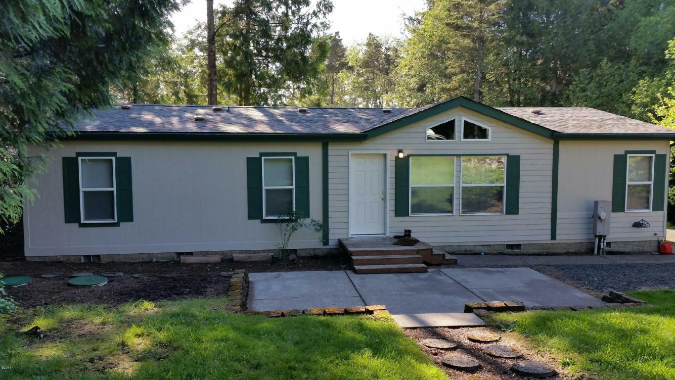 Property Photo: 12225 NE Coos Street OR 97365