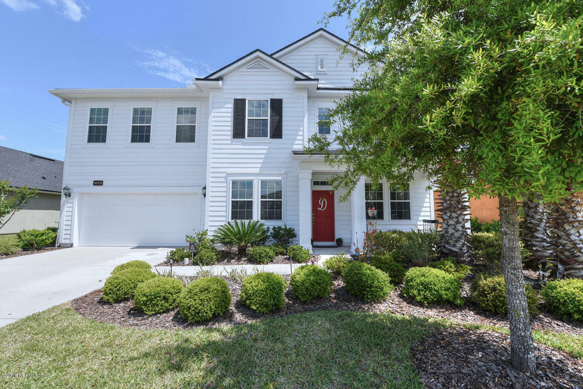 Property Photo: 16379 Magnolia Grove Way FL 32218