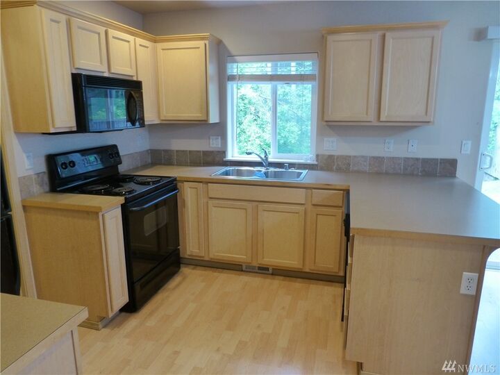 Property Photo:  22443 SE 244th St  WA 98038 