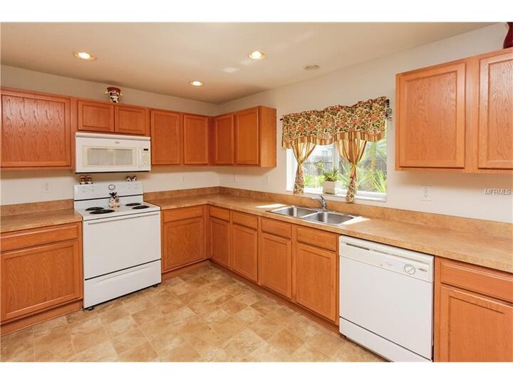 Property Photo:  9526 Simeon Drive  FL 34638 