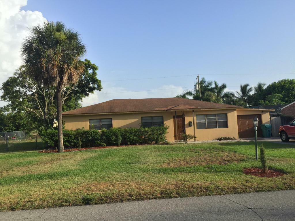 Property Photo:  130 SW 14th Avenue  FL 33435 