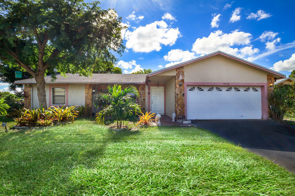 Property Photo:  1024 SW 49th Way  FL 33068 