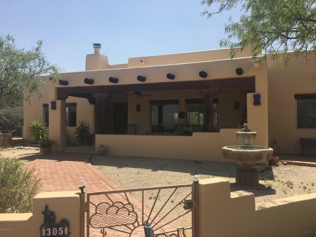 Property Photo:  305 S Melpomene Way  AZ 85748 