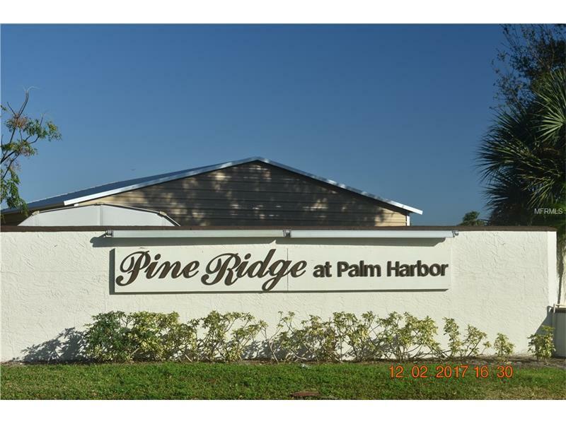 Property Photo:  1724 Pine Ridge Way W E2  FL 34684 