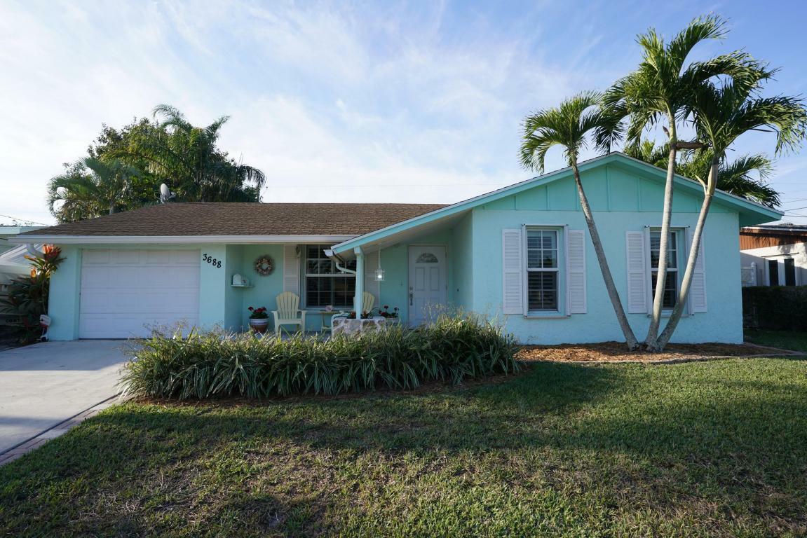 Property Photo:  3688 Holiday Road  FL 33410 