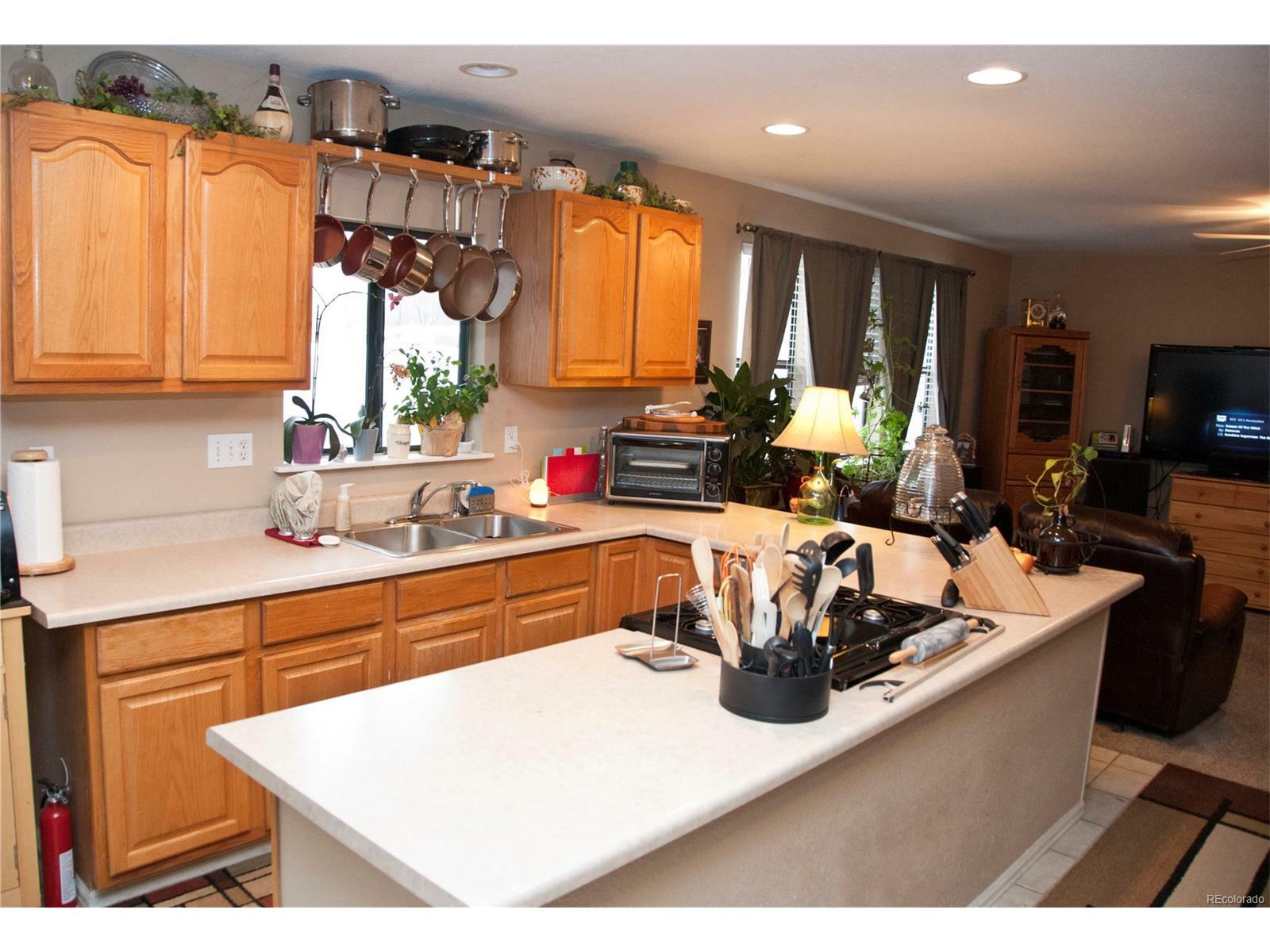 Property Photo:  15507 Caroline Avenue  CO 80621 