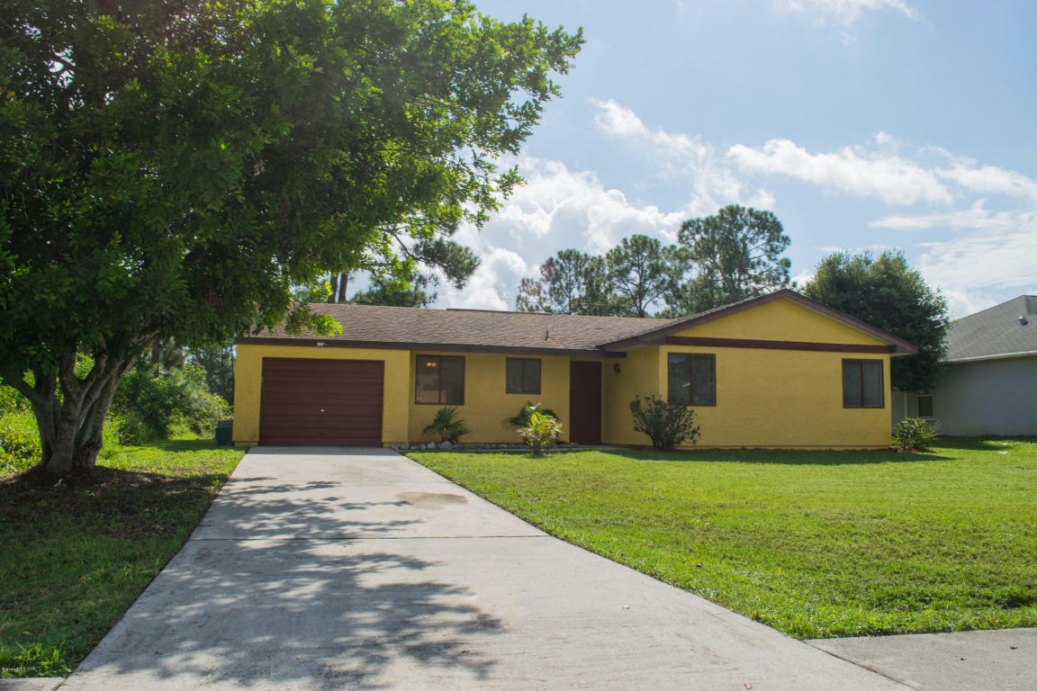 Property Photo:  1647 NW Jupiter Boulevard  FL 32907 