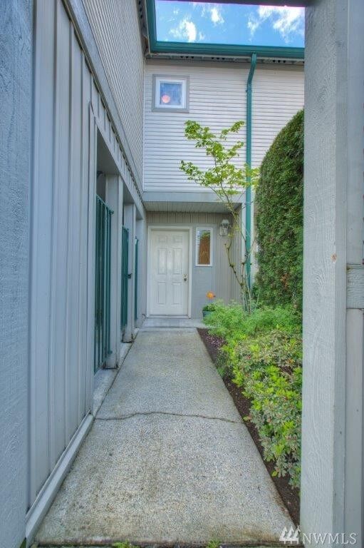 Property Photo: 6711 S 239th Place A103 WA 98032