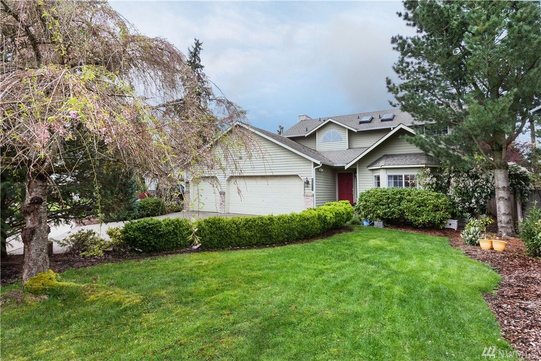 Property Photo:  4400 NE 6th Place  WA 98059 