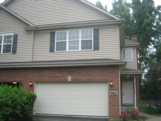 Property Photo:  448 N River Road 448  IL 60540 