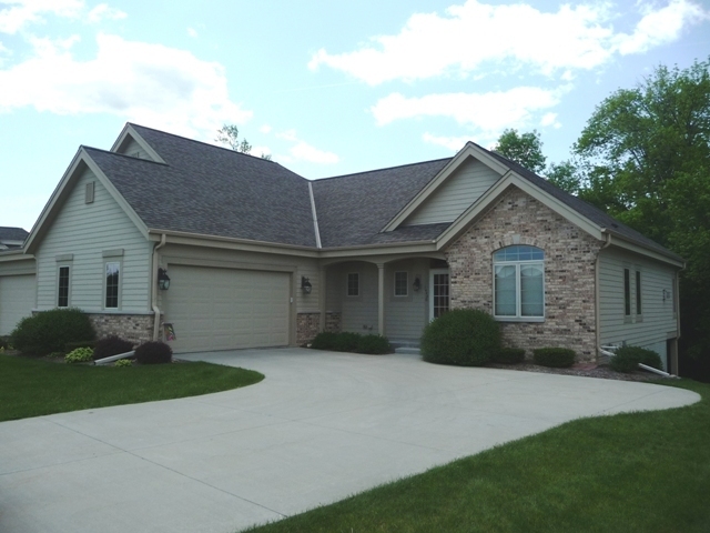 Property Photo:  1448 Hidden Waters Cir  WI 53095-8547 