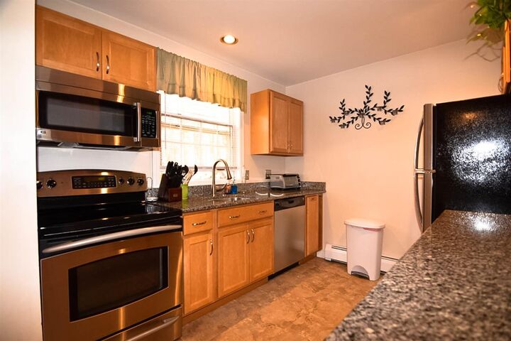 Property Photo: 1465 Hooksett Road 204 NH 03106
