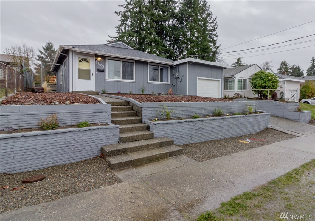 Property Photo:  8629 S G St  WA 98444 