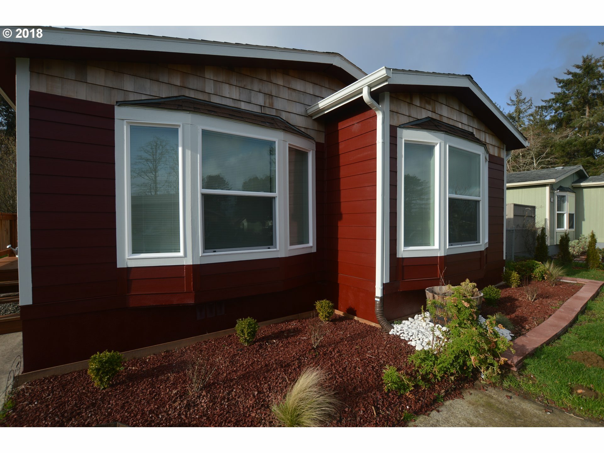 Property Photo:  117 SW Cedar Ave  OR 97146 