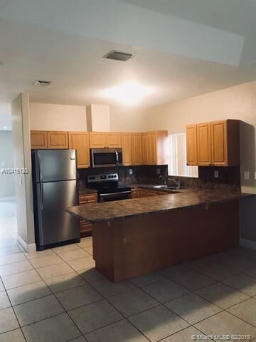 Property Photo:  216 SW 15th Ter  FL 33030 
