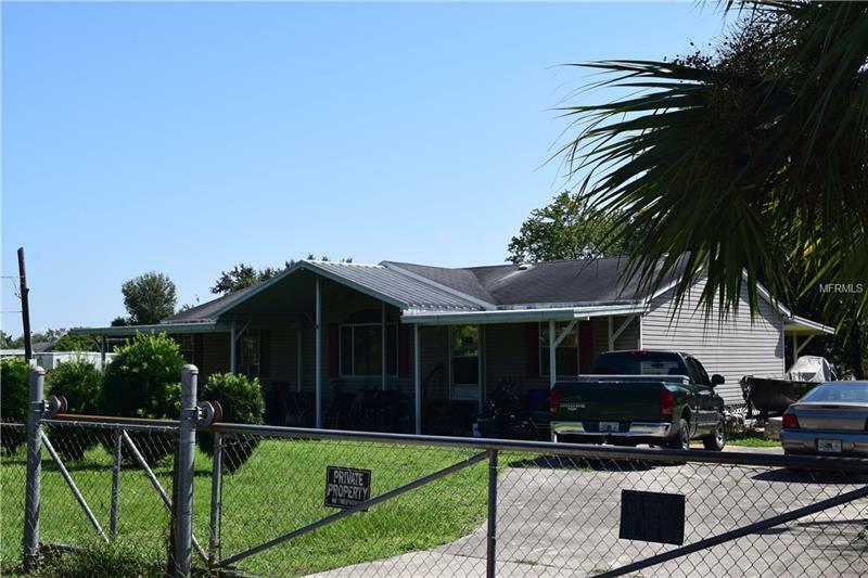 Property Photo:  5211 Miracle Road  FL 32808 