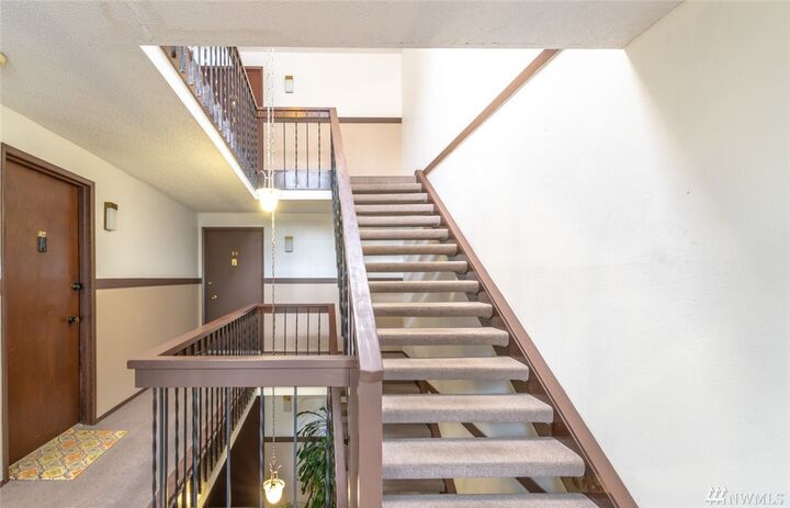 Property Photo: 7425 Ruby Dr SW E11 WA 98498