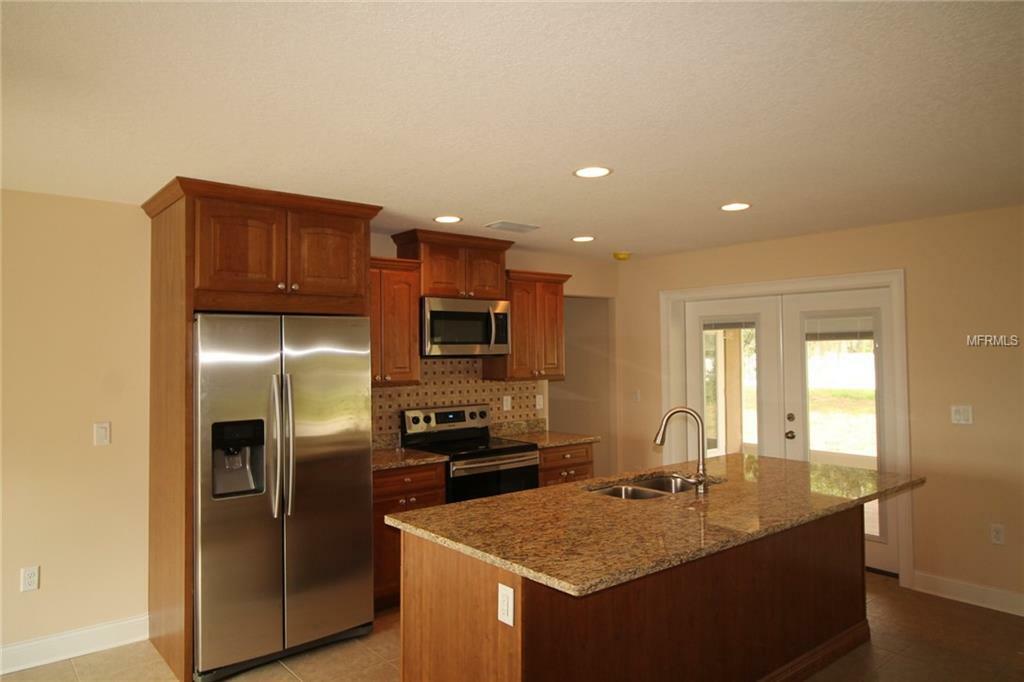 Property Photo:  641 W Lakeshore Drive  FL 34711 