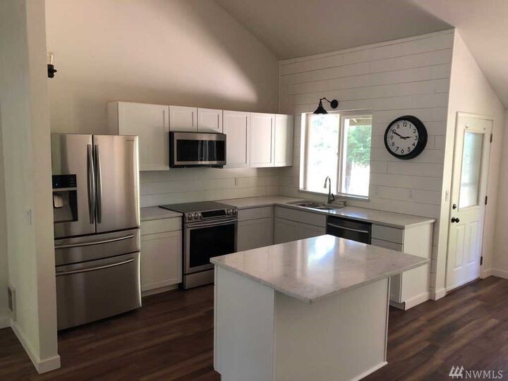 Property Photo:  1191 Nakata Place NW  WA 98110 