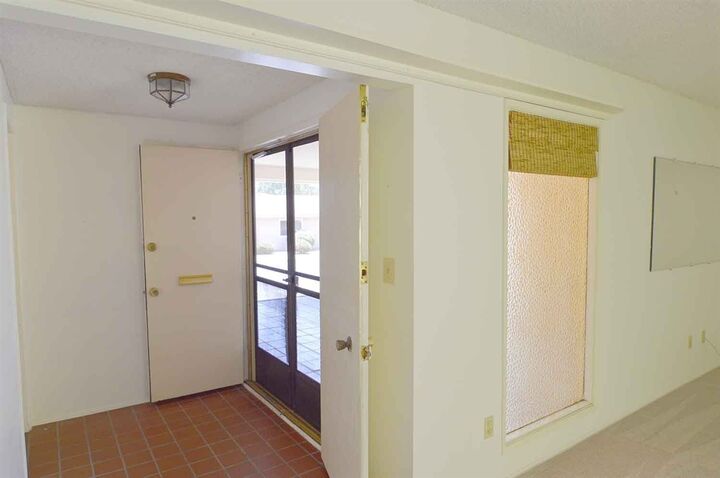 Property Photo:  1894 Fairway Park A  CA 92026 