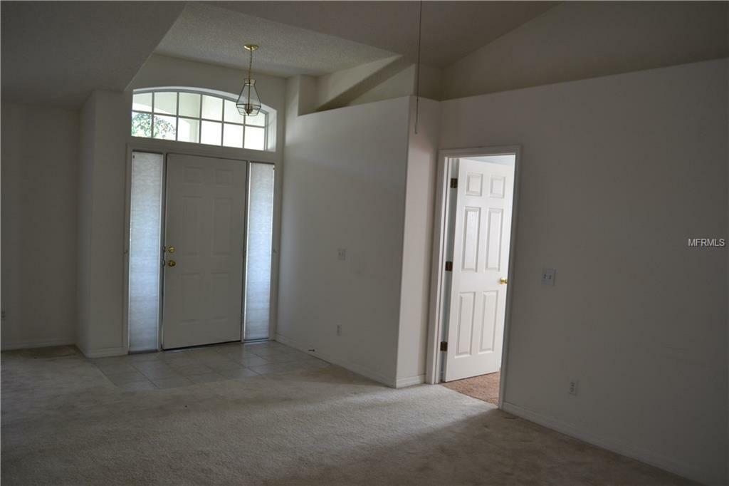 Property Photo:  878 High Pointe Circle  FL 34715 