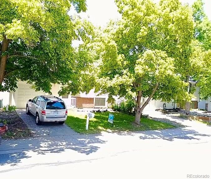 Property Photo:  3921 South Pagosa Street  CO 80013 