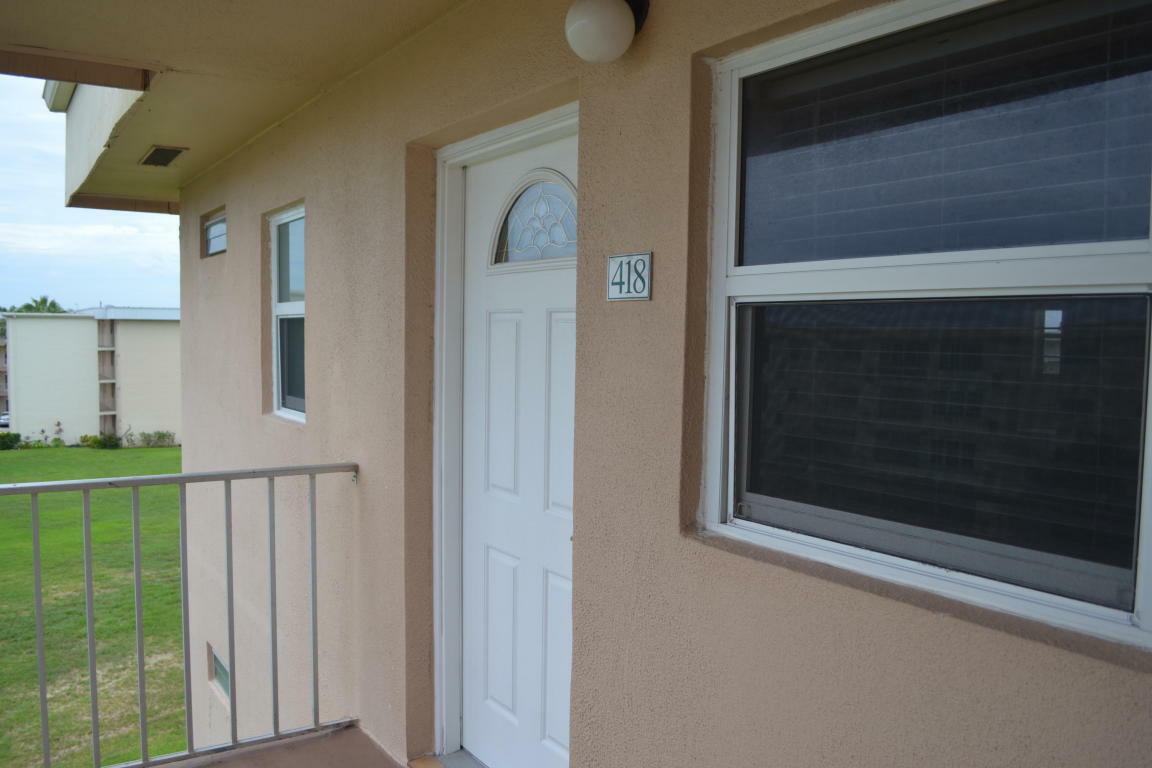 Property Photo:  230 NE 26th Avenue 418  FL 33435 