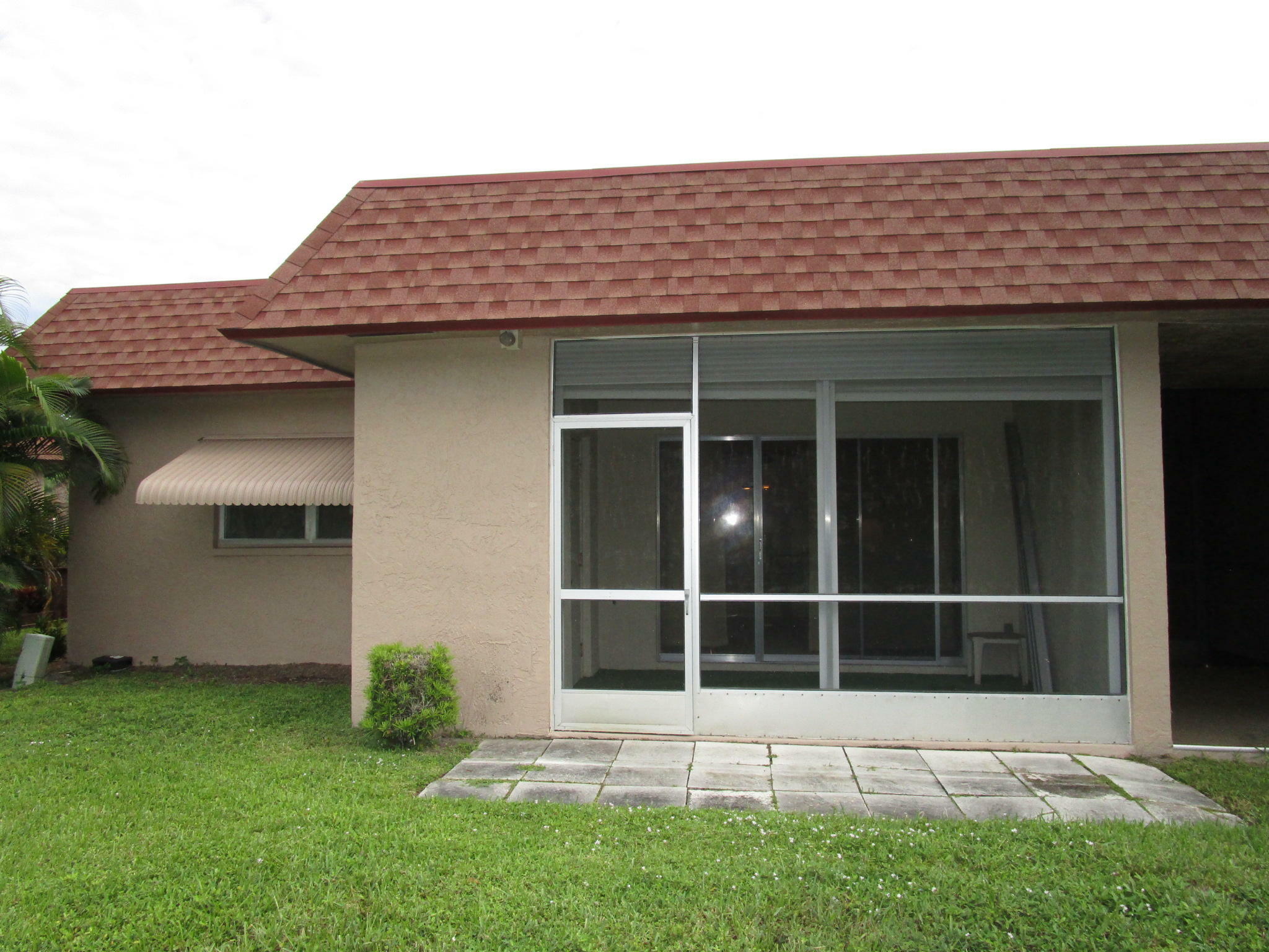 Property Photo:  1892 Palmland Drive C  FL 33436 