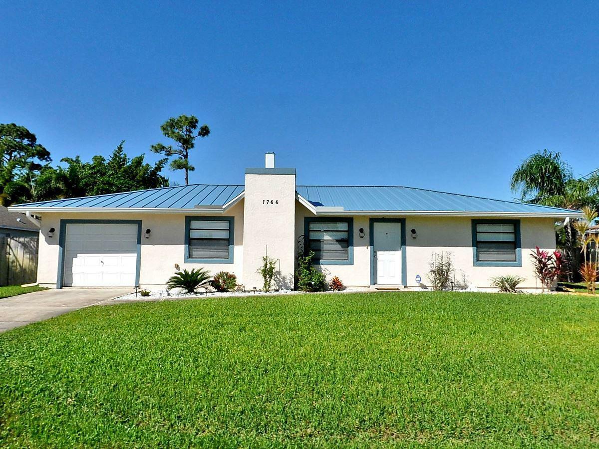 Property Photo:  1766 SW Carolina Street  FL 34953 