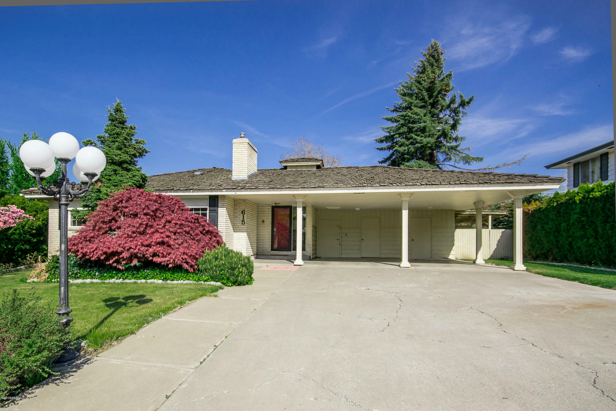 Property Photo:  615 N 47th Ave  WA 98908 