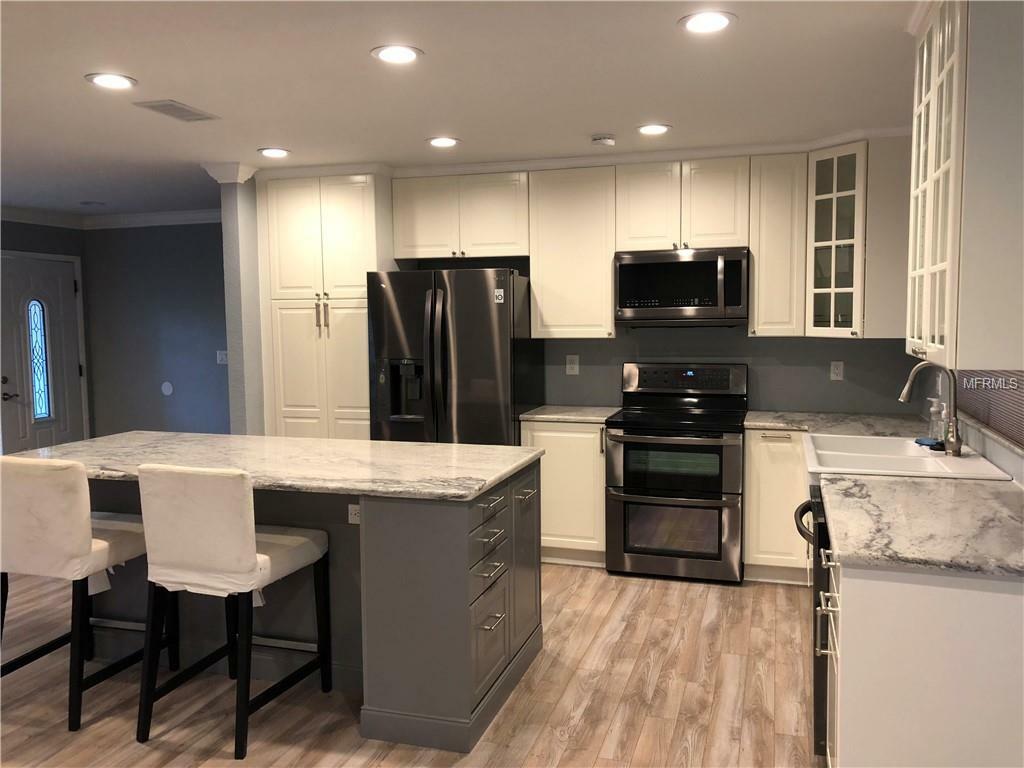 Property Photo: 16214 E Course Drive FL 33624