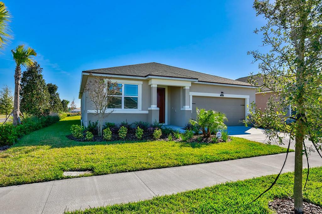 Property Photo:  13125 Rain Lily Drive 140E  FL 33579 