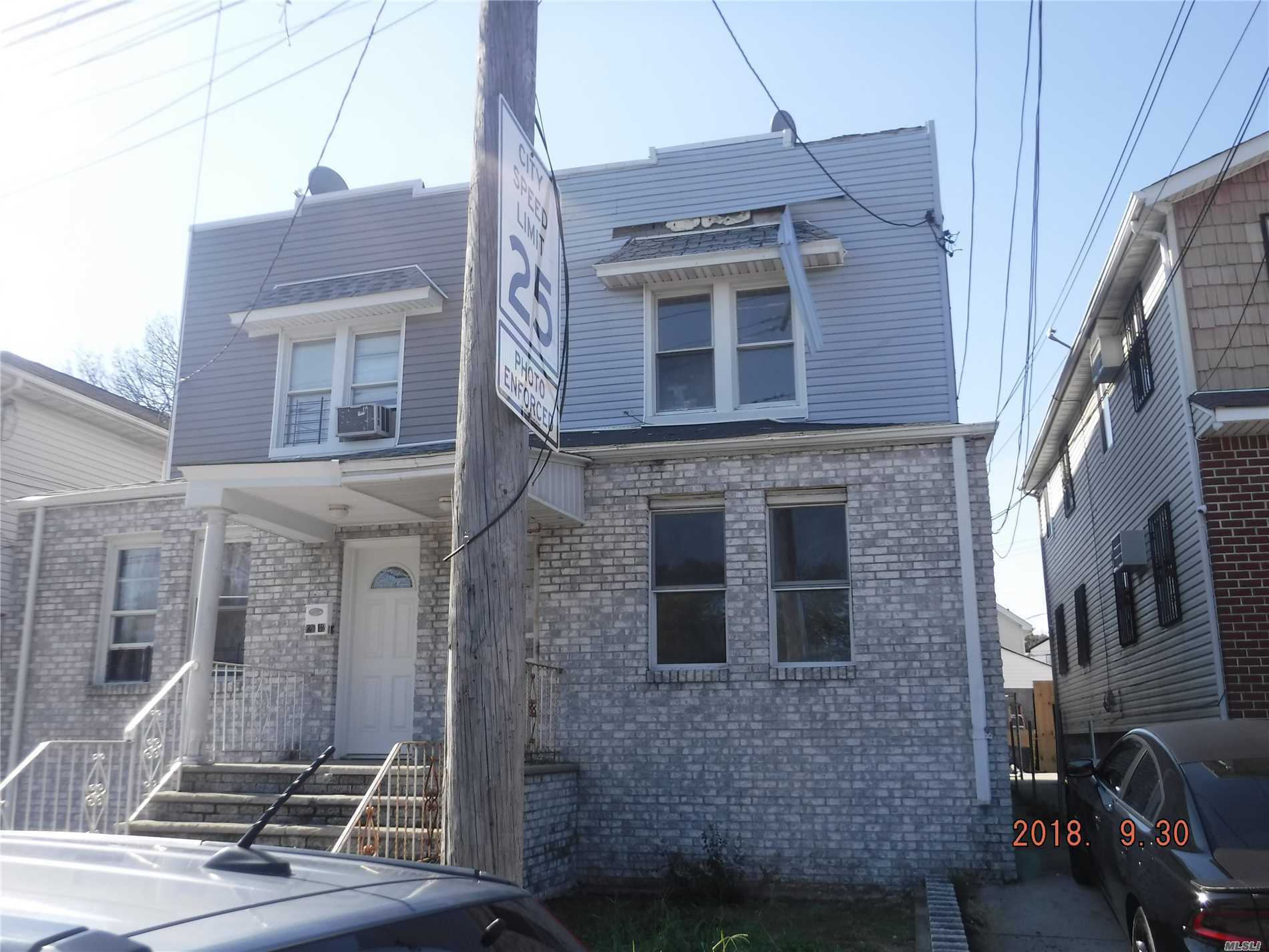 Property Photo:  128-40 150th Street  NY 11436 