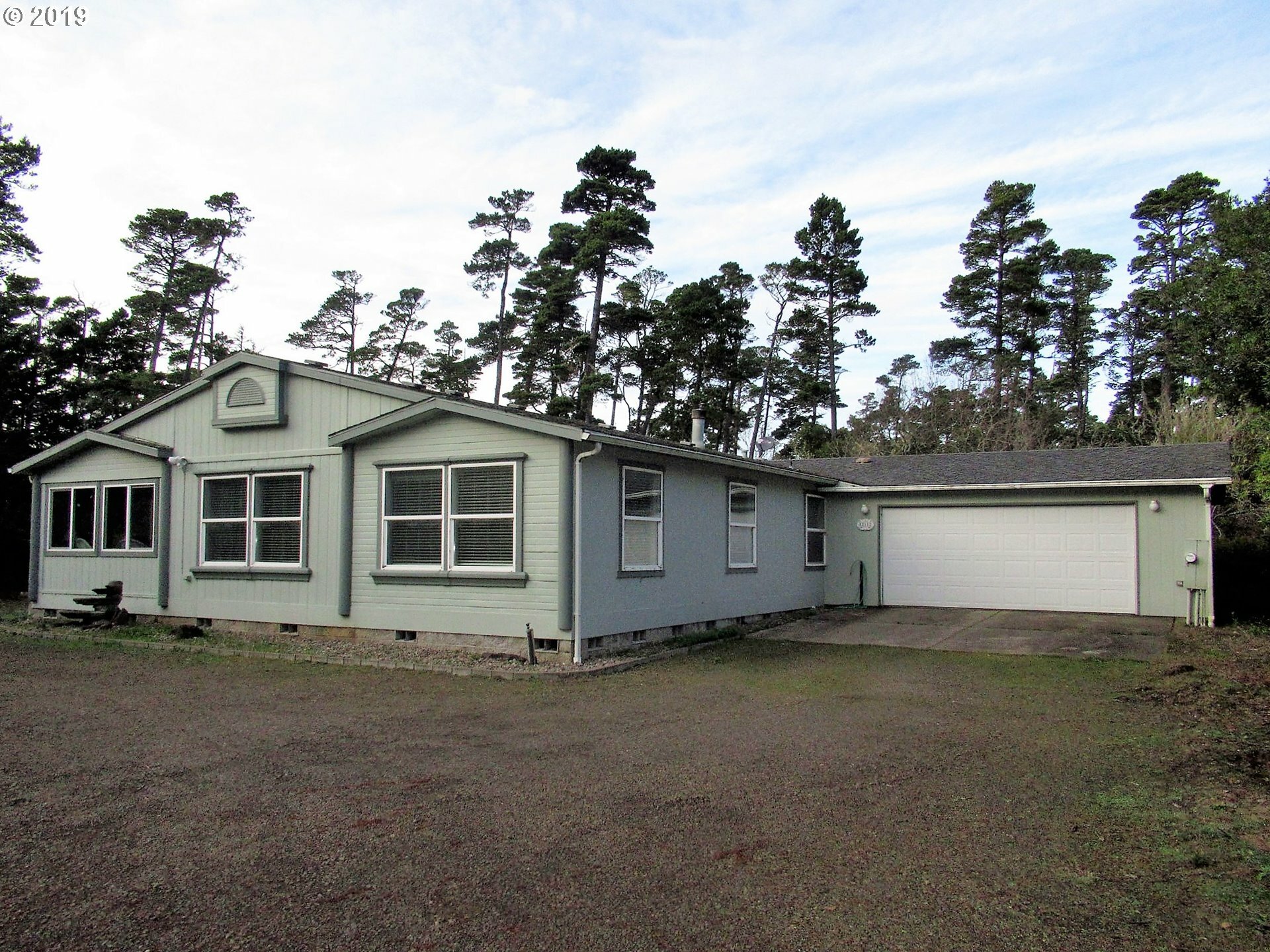 Property Photo:  88112 Woodlands Dr  OR 97439 