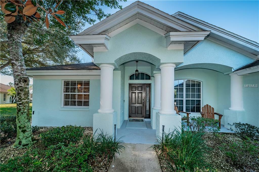 Property Photo:  1002 Sawgrass Drive  FL 34689 