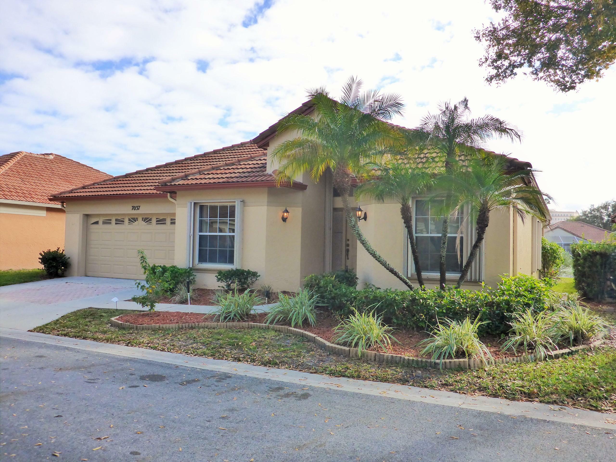 Property Photo:  7037 Galleon Cove  FL 33418 