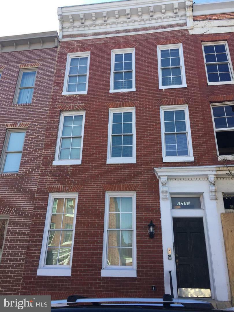 Property Photo:  1713 Hollins Street 1  MD 21223 