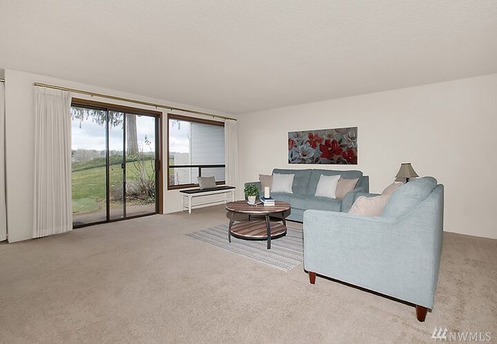 Property Photo:  904 East Bay Dr NE B104  WA 98506 